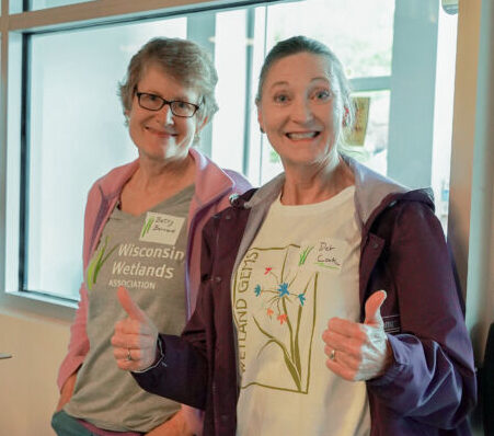 A photo of Executive Director Tracy Hames wearing a camo hat and smiling, and a photo of several WWA staff and board members standing at the edge of a wetland.